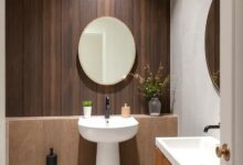 Elevate Your Powder Room: Dark Wood Accent Walls for Timeless Charm