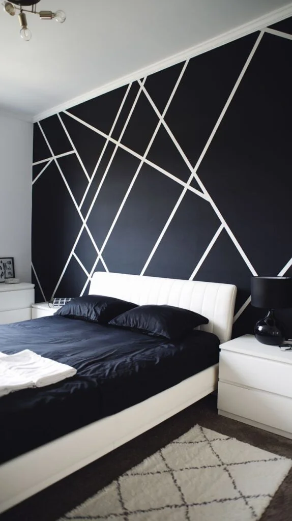 Black accent wall with thin white fractured geometric lines