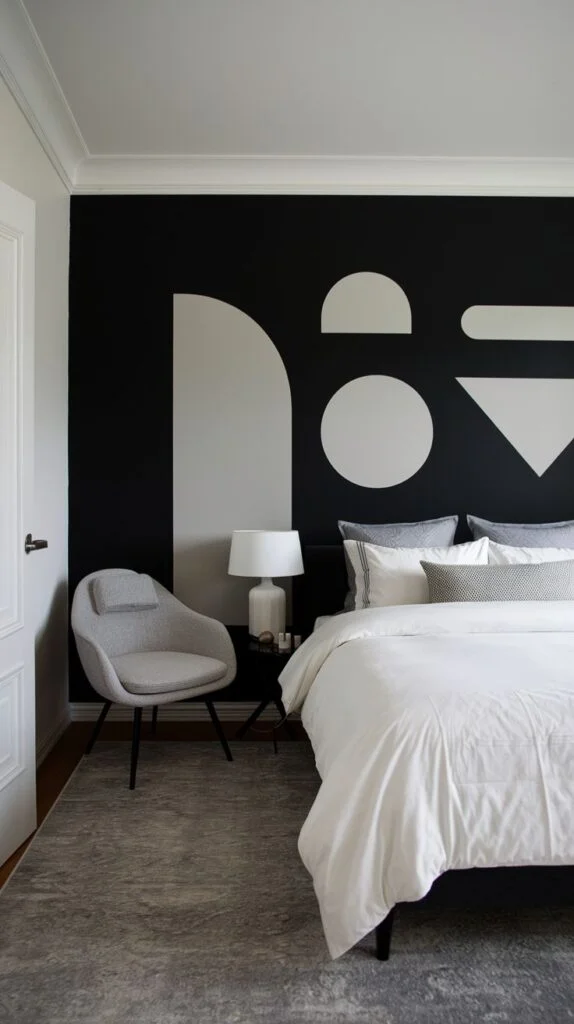 Minimalist black accent wall with large white graphic shapes