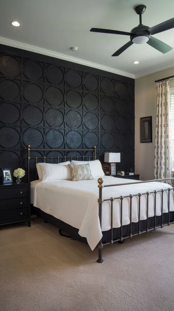 Black accent wall covered in repeating dimensional circular panels