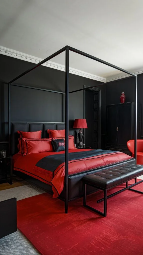 Black and red bedroom with black four-poster bed, red bedding, and red rug.