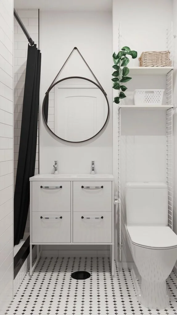 Small bathroom with black and white geometric floor tiles, dual white sinks, circular mirror, and open shelving
