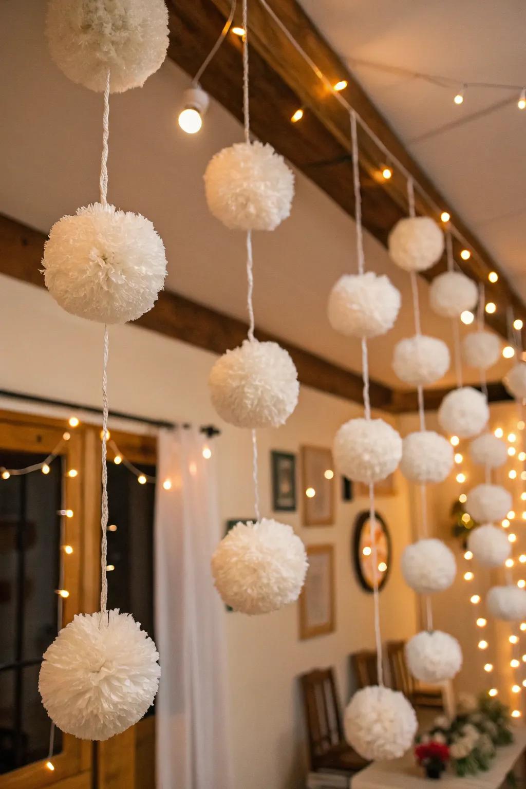 Pom pom garlands resembling snowballs