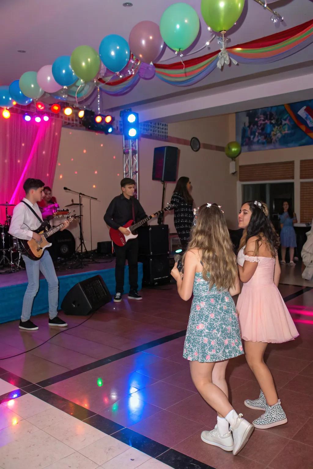 Energetic live music performance at a sweet sixteen.