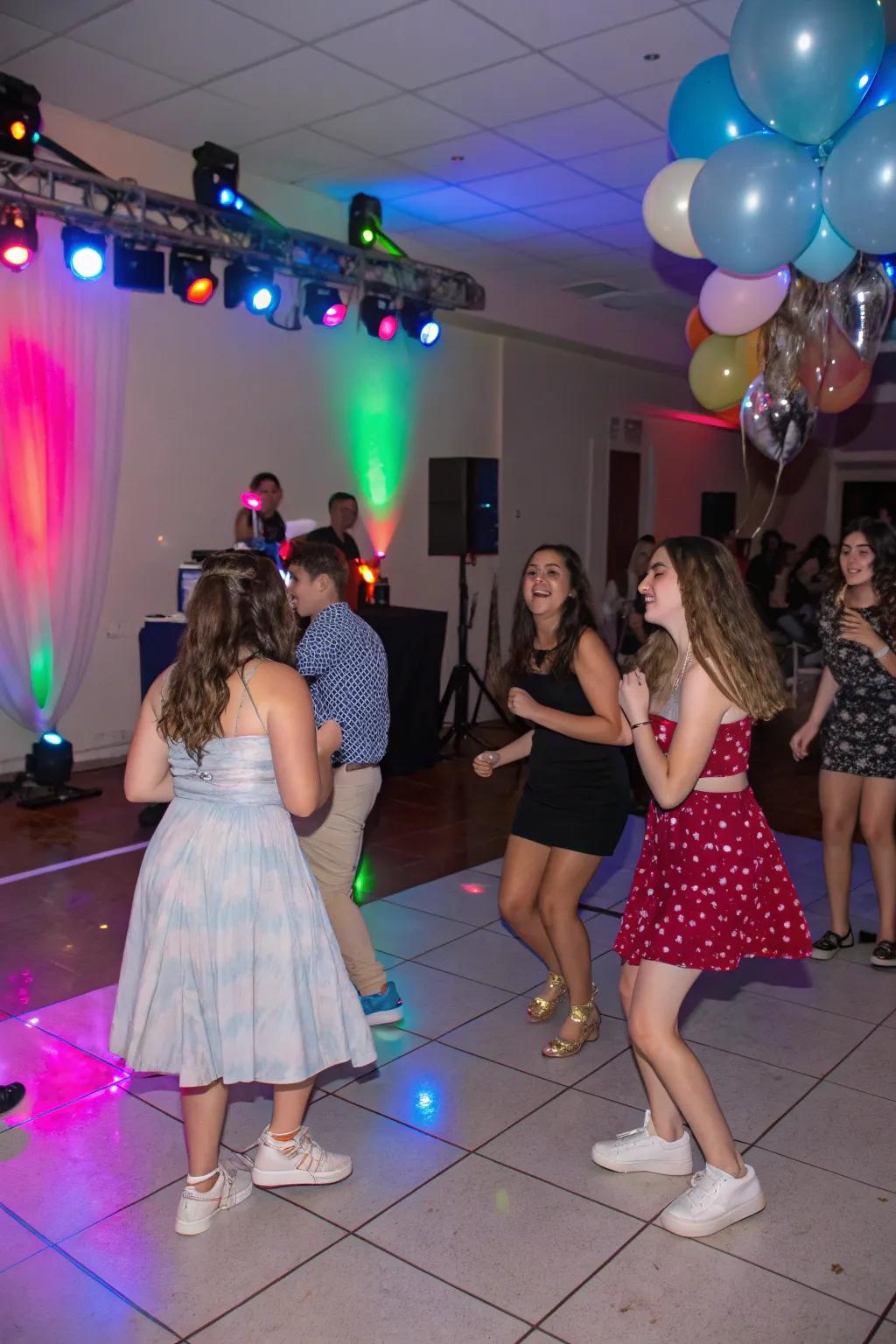 Energetic dance floor at a sweet sixteen party.