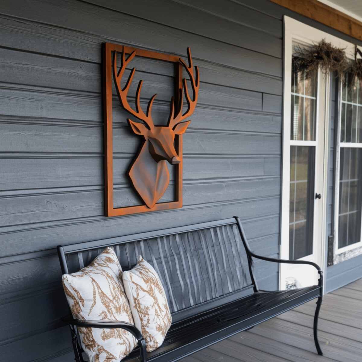 Metal wall art on porch
