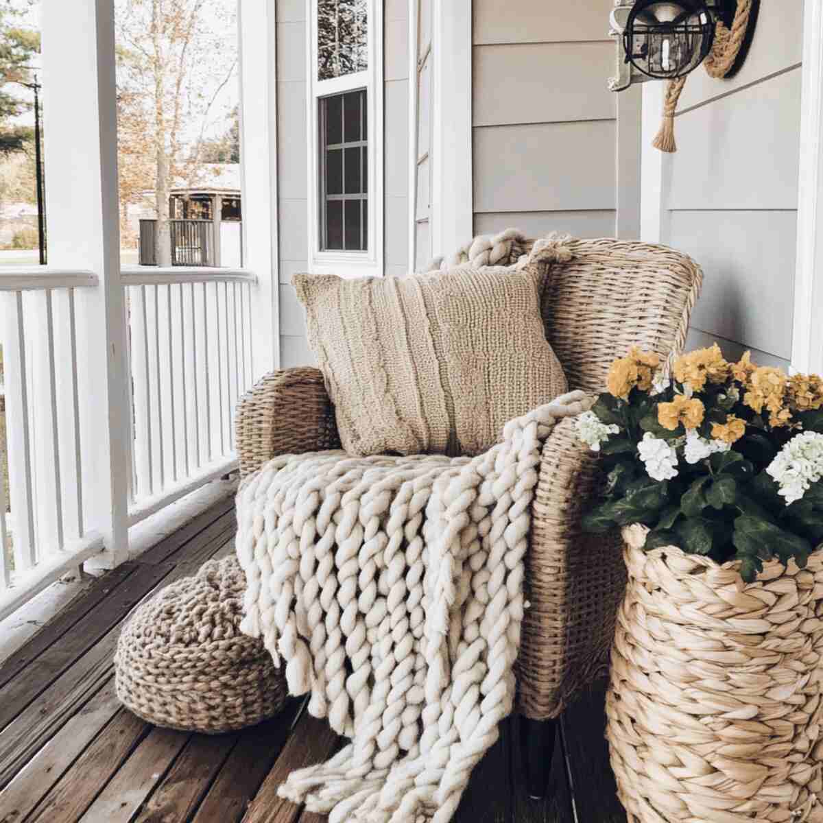 Cozy throw blankets on porch seating