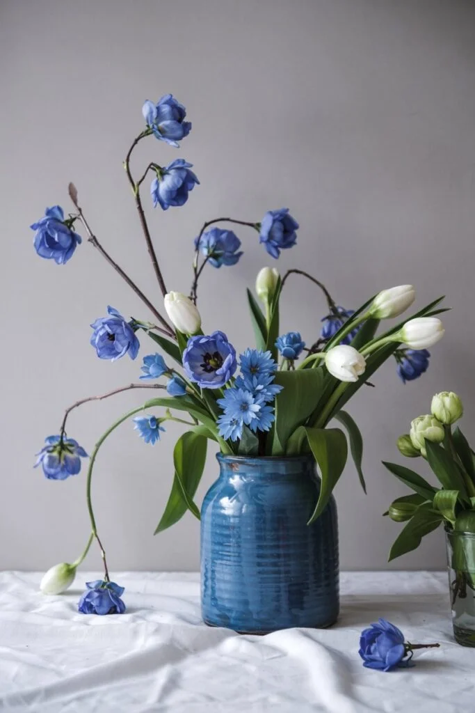 Blue Vase with White Flowers