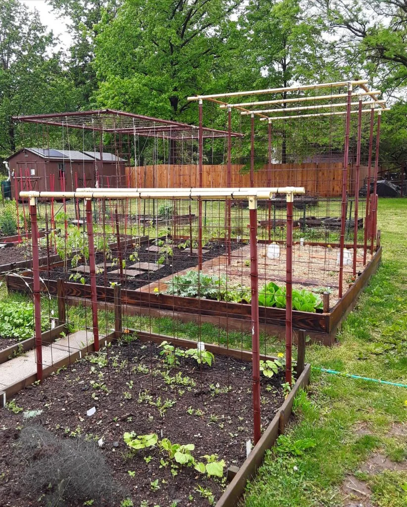 Red metal multi-tiered garden structure
