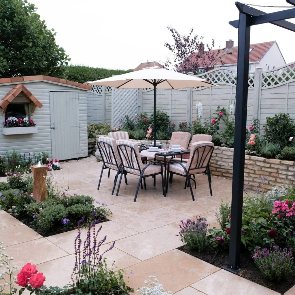Community garden with dining area and flower beds