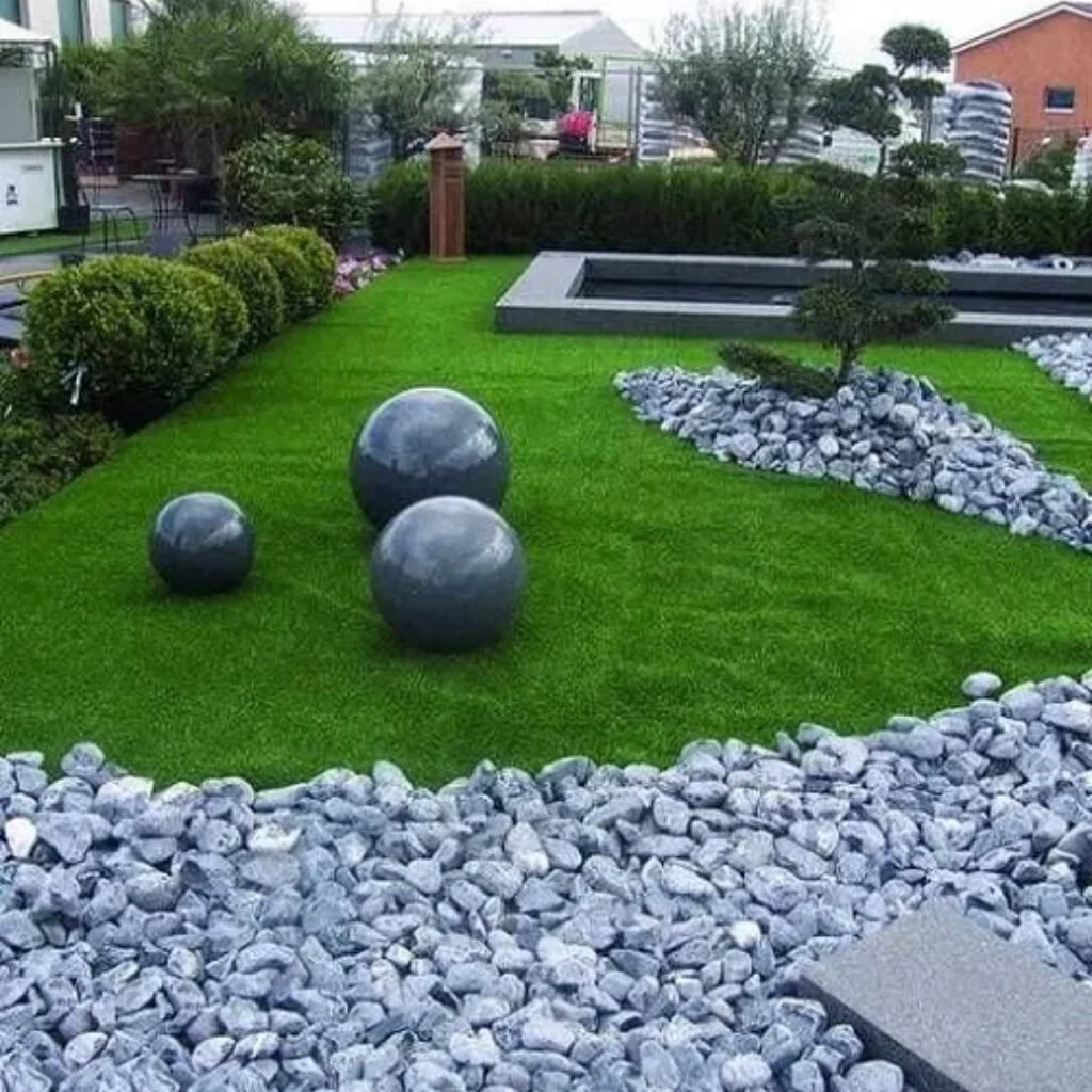 River rock garden accent with spheres